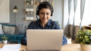 WFH employee working in home office.