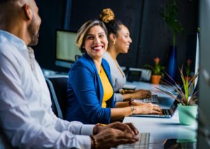 happy employees engaged in call center work